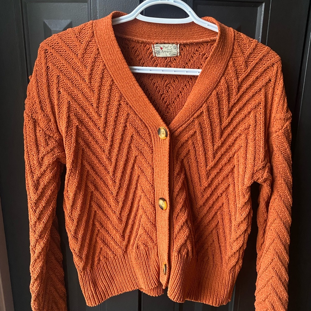 Poof Apparel Orange Chevron Cardigan Sweater
